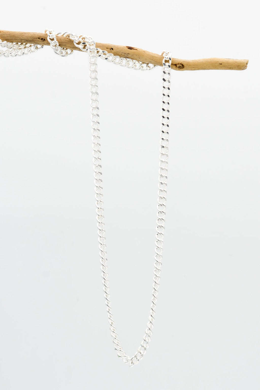 Curb chain